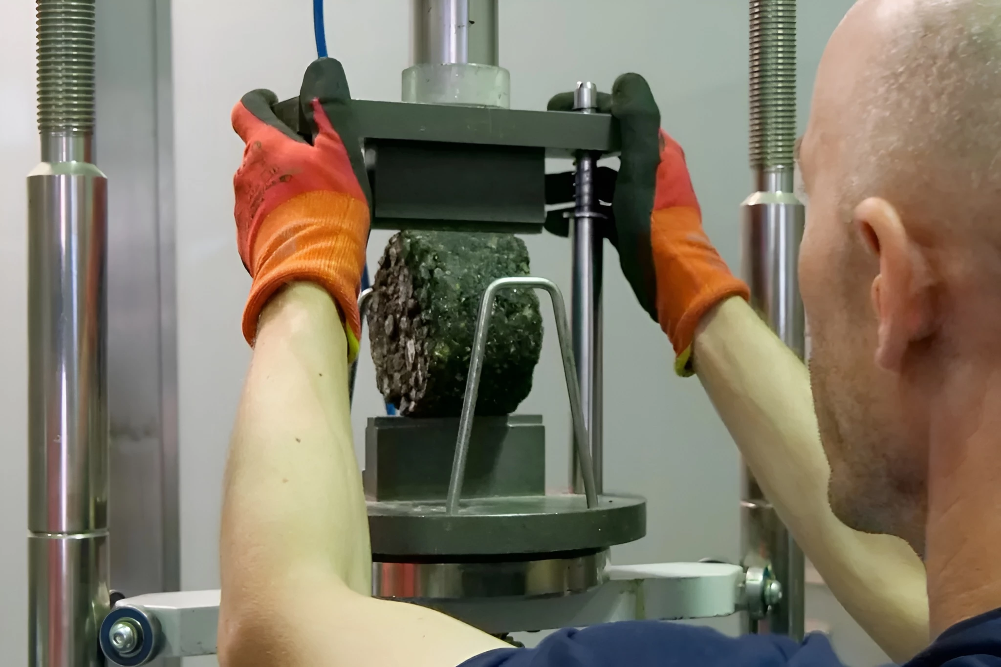 A piece of cigarette-butt-enhanced asphalt gets strength-tested