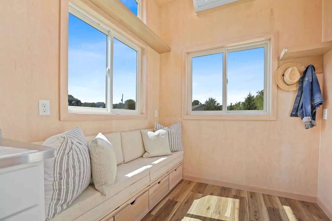 The Sea Chord's living room includes a large sofa bed