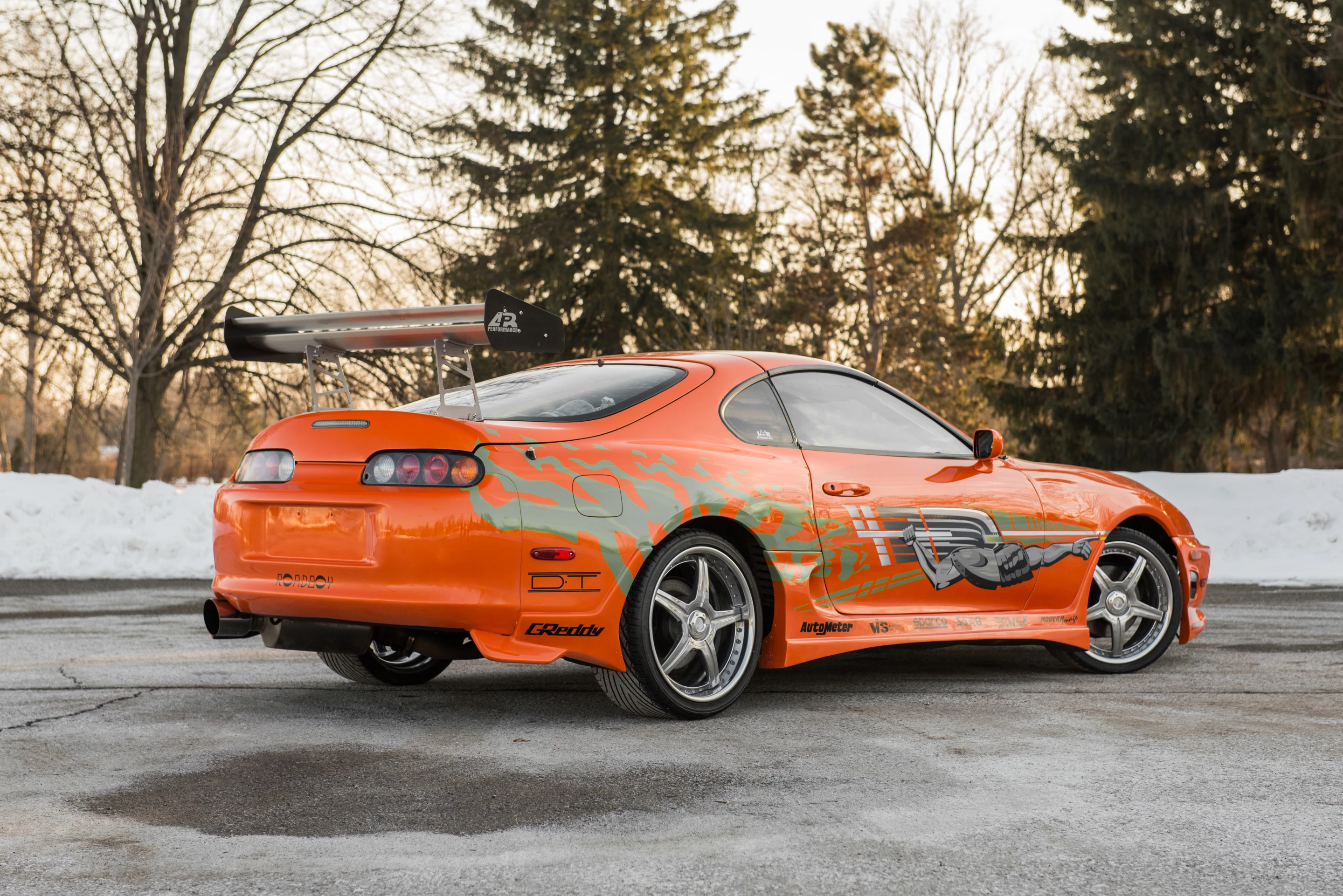 This car just might be one that surprises as the recently deceased Paul Walker is the posthumous star of Furious 7, a movie that has just been released and is smashing box office records willy nilly. The car is the iconic orange Toyota Supra driven by Walker in The Fast and The Furious (2001), is expected to fetch $150,000 to $200,000 but ... anything could happen on the day.