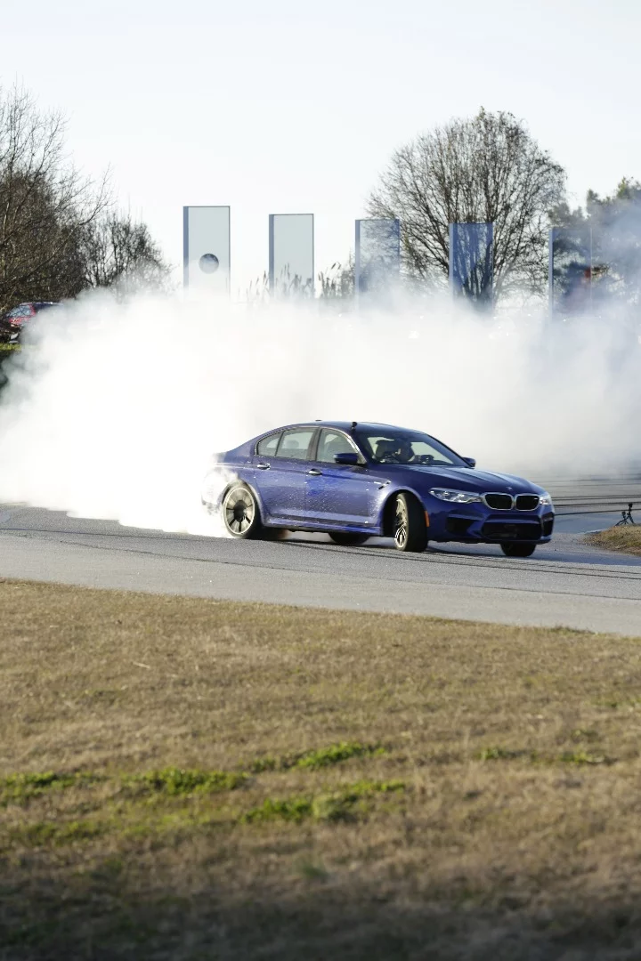 BMW's driving instructor, Johan Schwartz on his smoky final lap of the 232.5-mile record