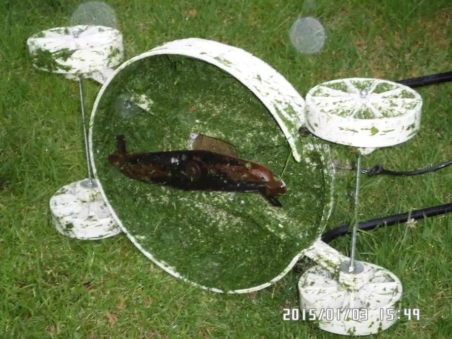 The blades, handle, switch and wheel shafts were transplanted from an old mower