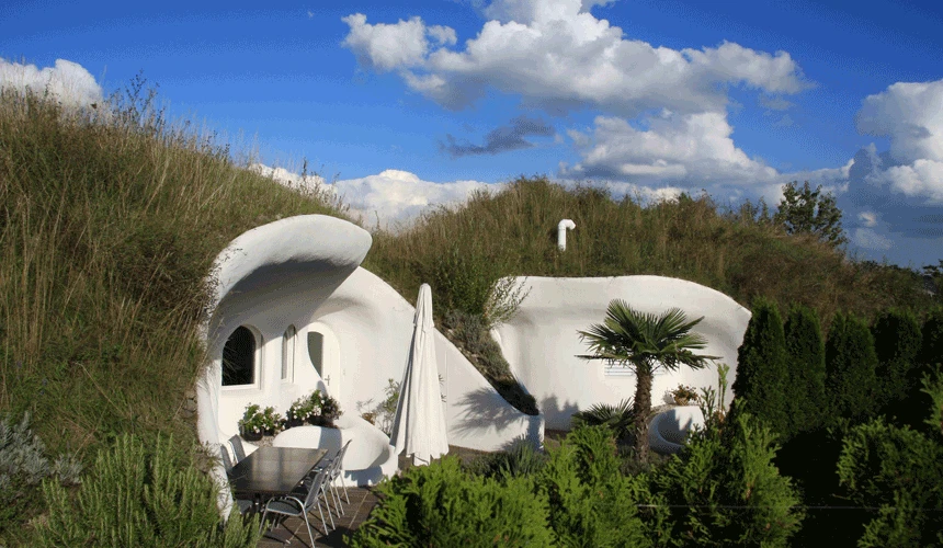 Peter Vetsch, a dominant force in earth house architecture, has built over 90 energy saving underground houses, with a strong nod to the organic forms of Gaudi