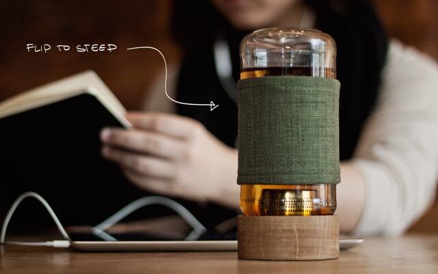 The Imbue vessel is filled with hot water, the lid screwed into place and then the whole container flipped upside down so that the strainer and tea leaves are submerged