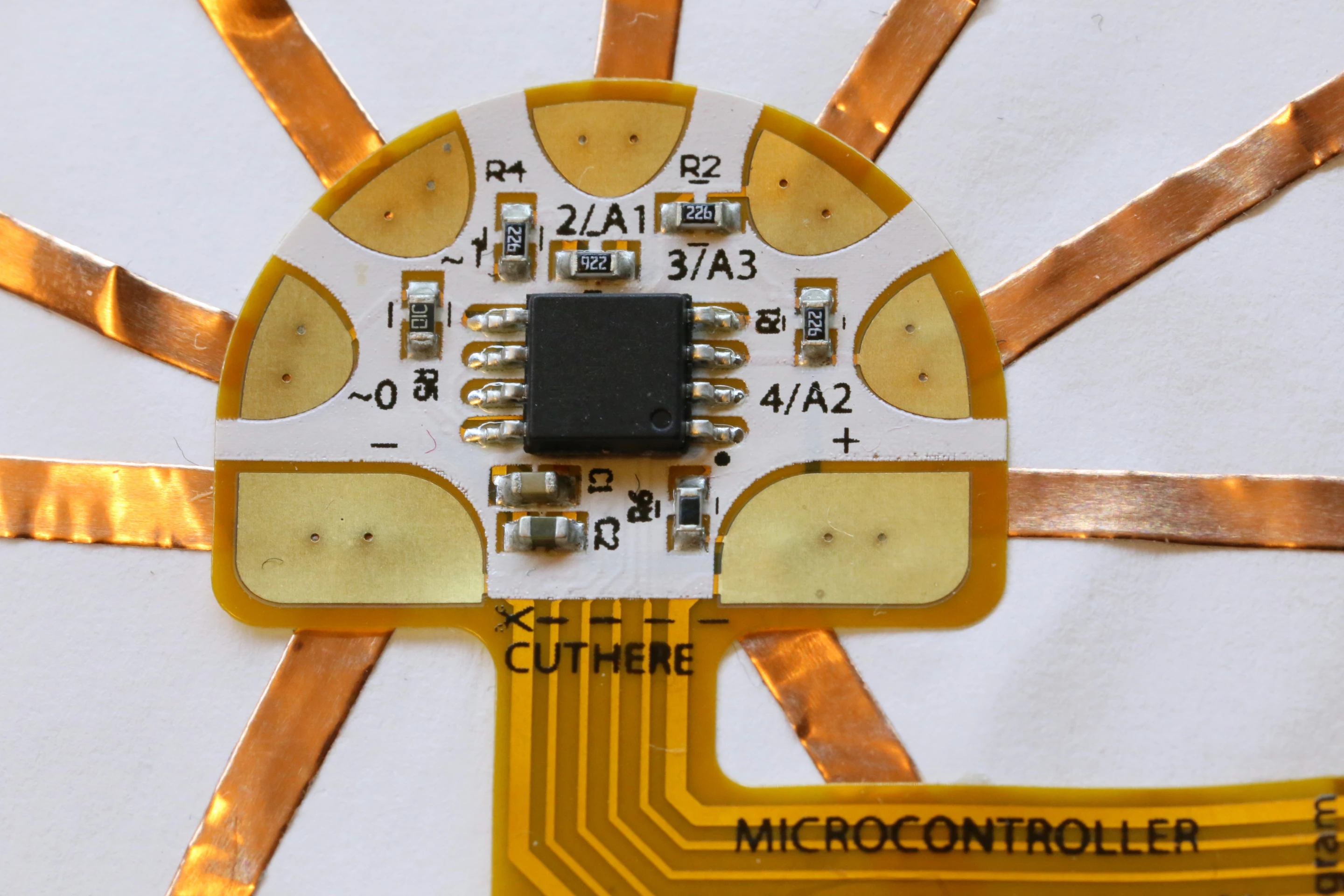 The touch-sensitive Chibitronic sticker can also be used as a programmable microcontroller