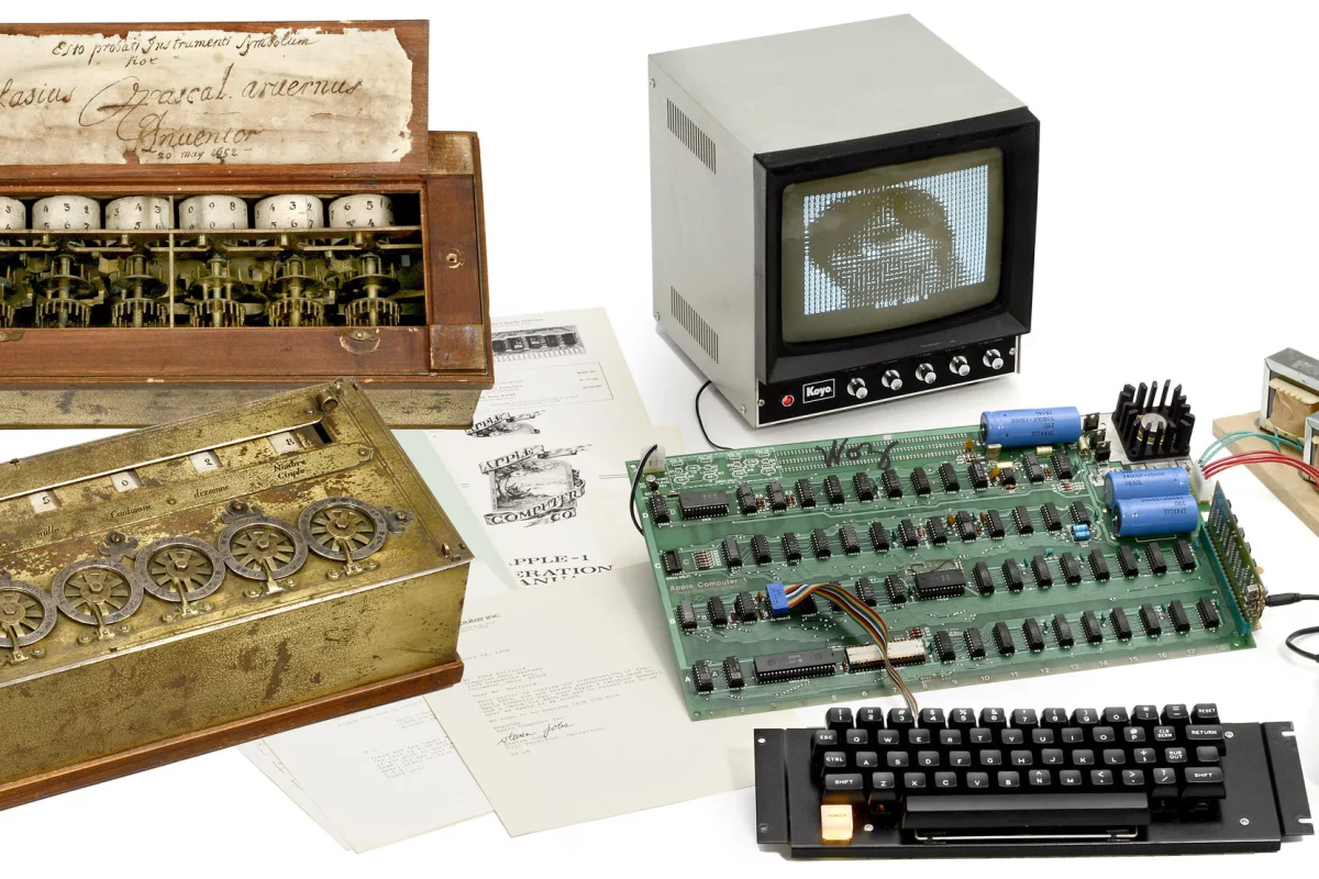 The Auction of Firsts includes an original Apple 1 computer from 1976, and a reproduction Pascaline mechanical calculator