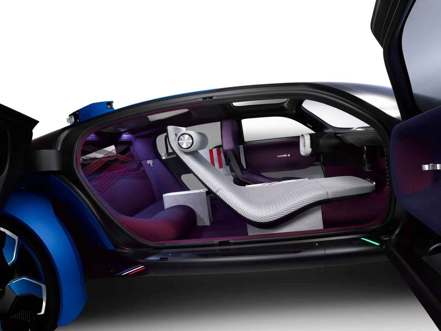 Interior offers a sporty driver's seat, a chaise lounge for the front passenger and basically a sofa in the back, with criss-crossing strings for head support