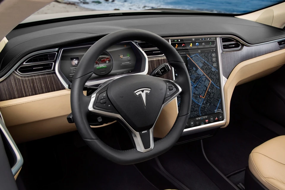 Drivers stay in the car while the system automatically removes and replaces the old battery