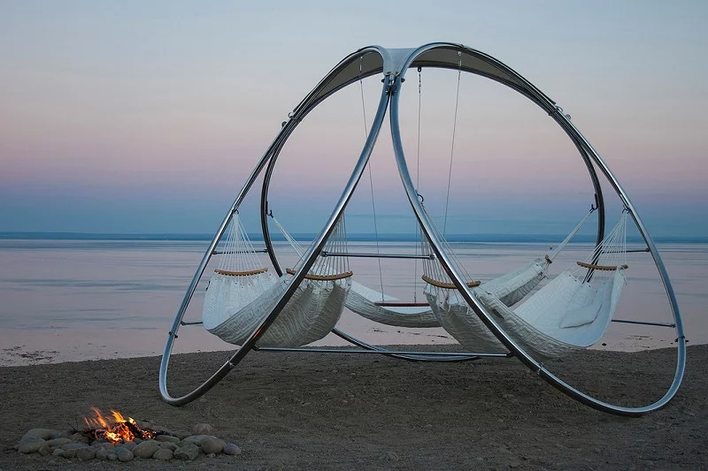 The modern-looking Infinity works beautifully on a beach as the sun goes down