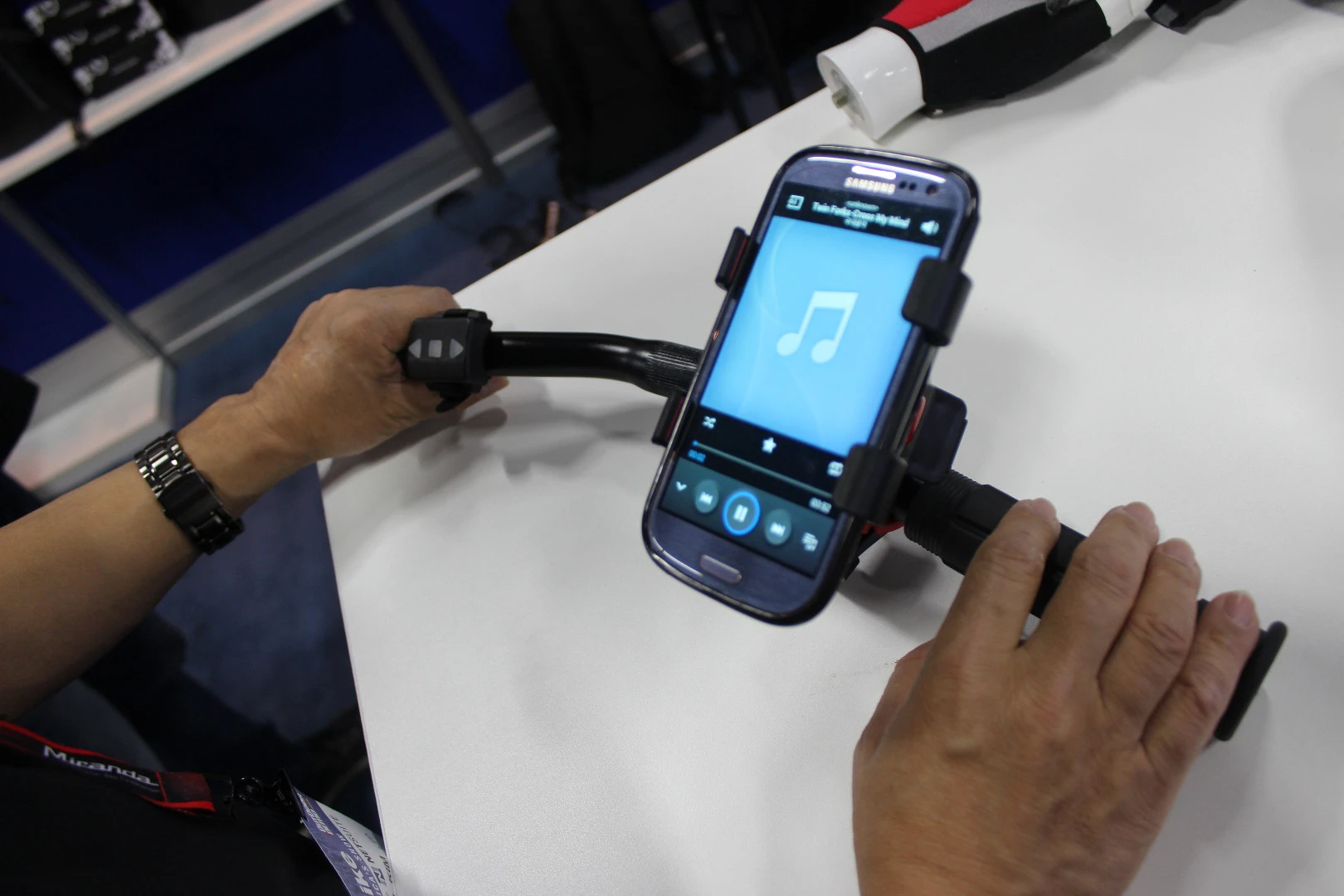 The Elecwear vest's turn indicators are activated a bar-mounted remote (left)