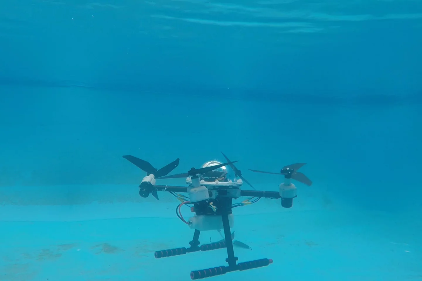 The TJ-FlyingFish is claimed to be lighter than other experimental aerial/aquatic drones, which simply add underwater hardware to a standard quadcopter body