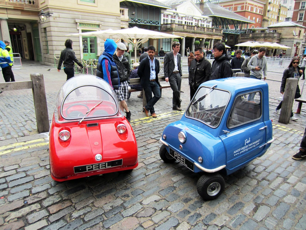 Originally manufactured in the 1960's, the world's smallest ever production car, the Peel P50 (right) and it's stablemate, the Trident (left) are getting a limited production run with updated powerplants