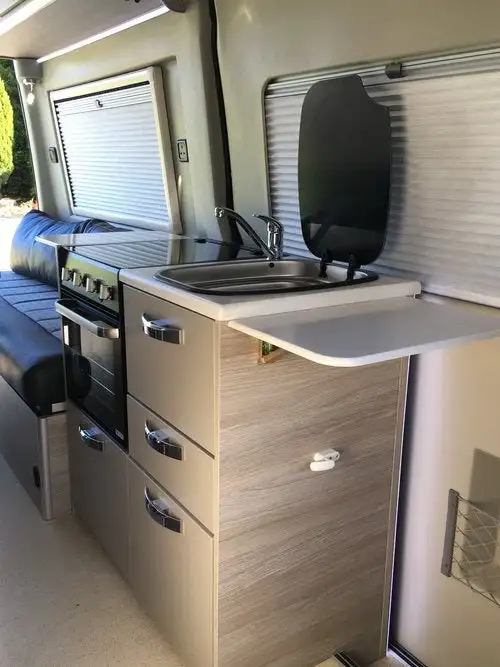 RP includes a very nice kitchen with oven, broiler, fridge and three-burner stove