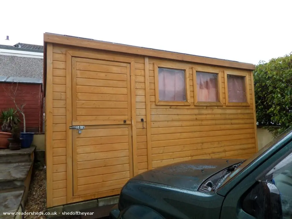 The Dolls' House is a simple shed that contains a whole lot of doll houses