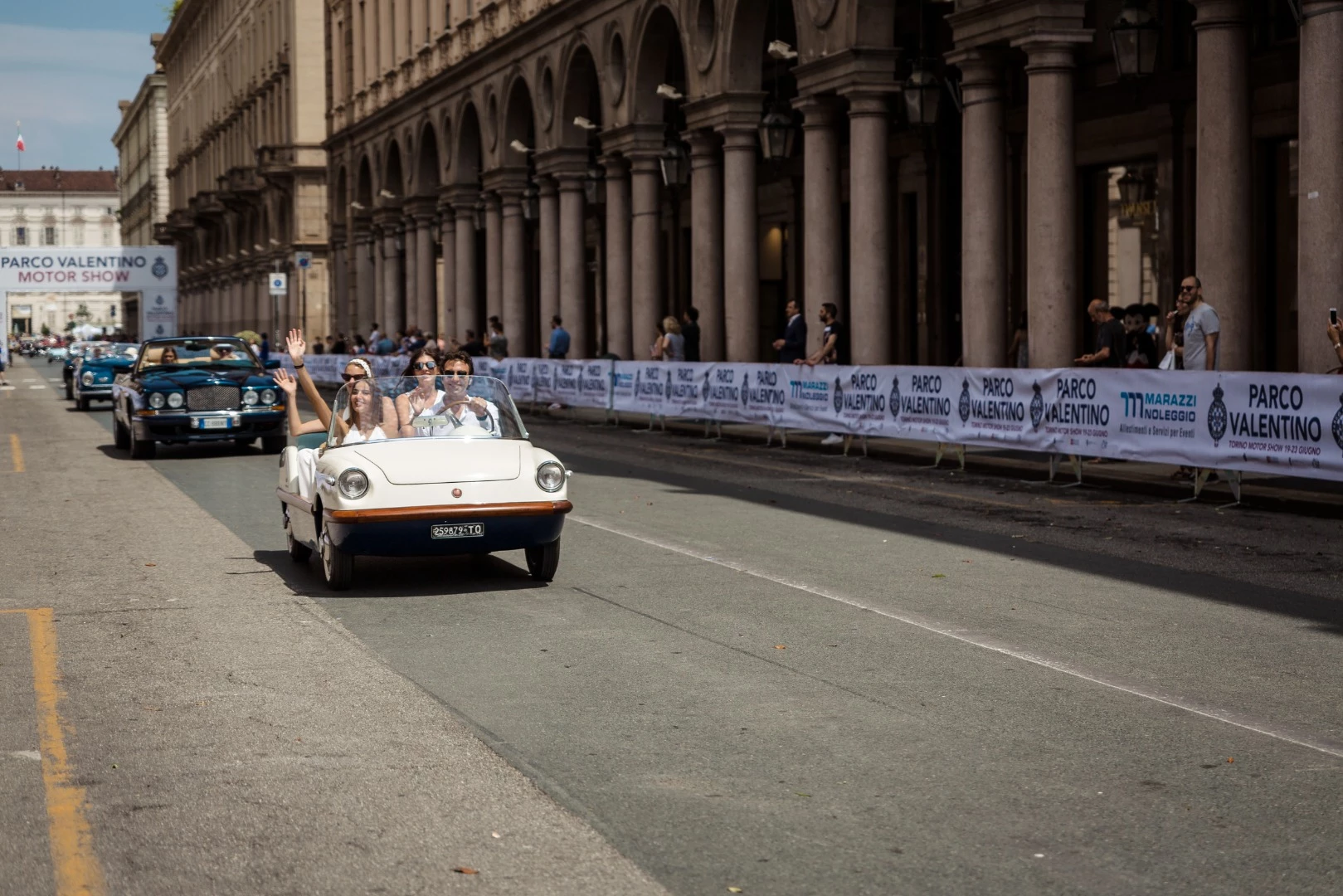 The contestants parade on the streets of Turin, passing along the same avenues of what was once the circuit of the Valentino Formula One Grand Prix