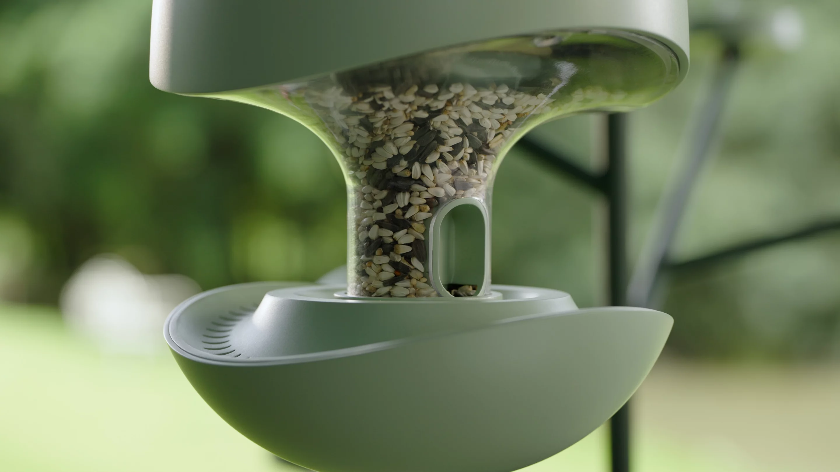 The feeder wicks humidity from the container to keep seeds fresh