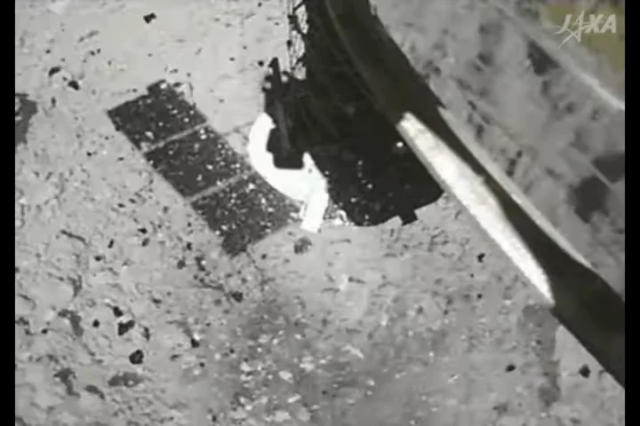 Hayabusa 2 moments after touching down on the surface of the asteroid