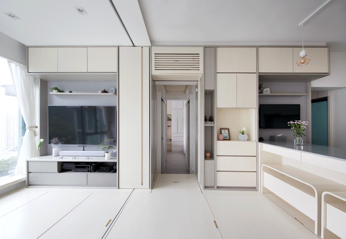 Hong Kong-based architectural firm Sim-Plex has recently converted an open two-bedroom apartment into a smart, space-saving family home