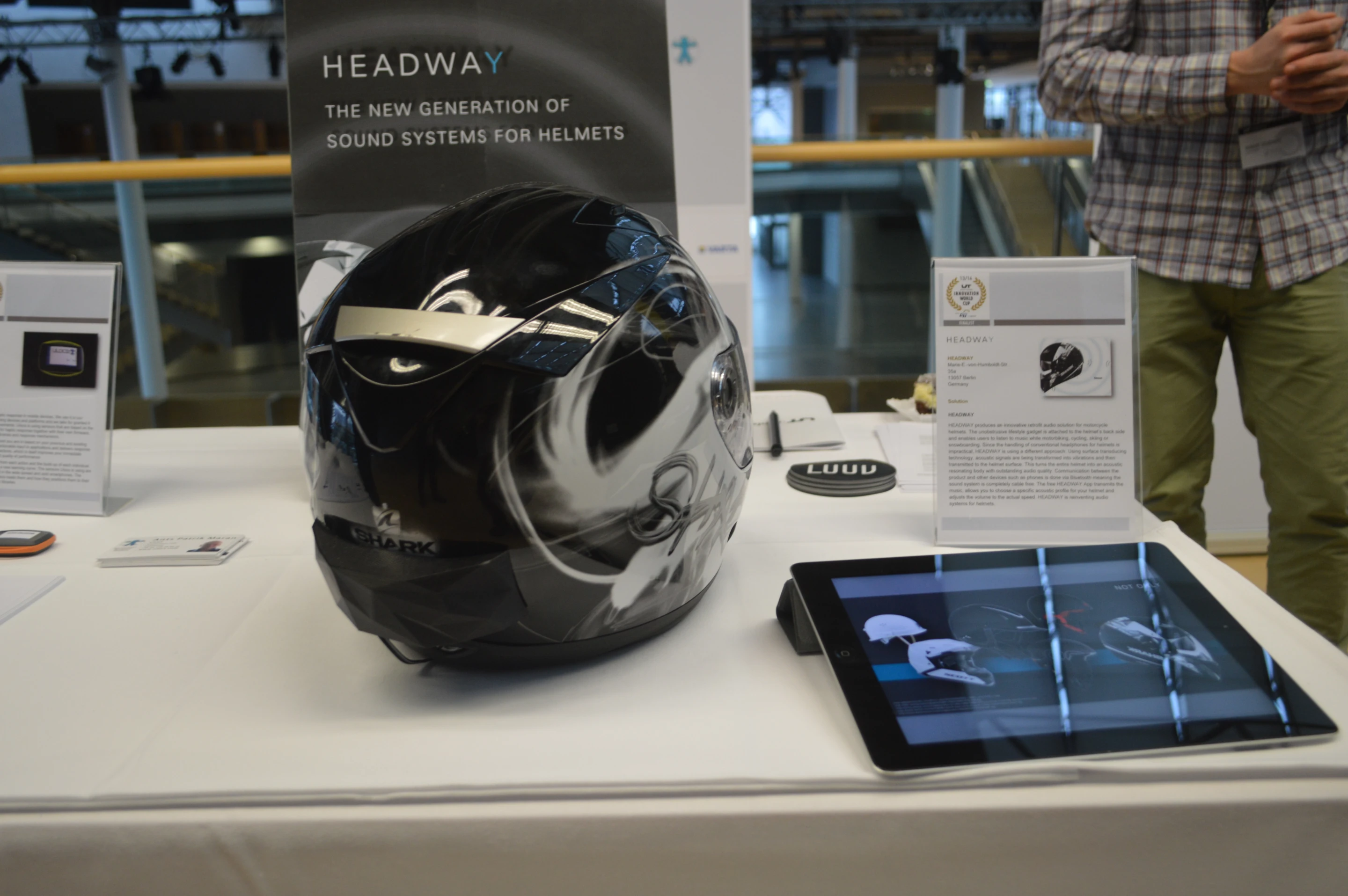 The device is paired via Bluetooth with a smartphone running an app, with which users can control their music