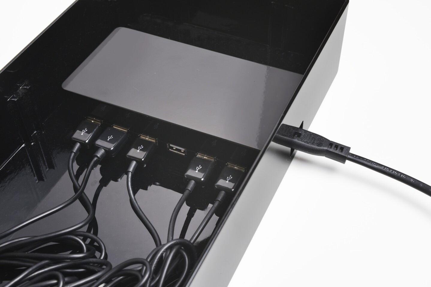 The side of the All-Dock with a number of cables hooked up
