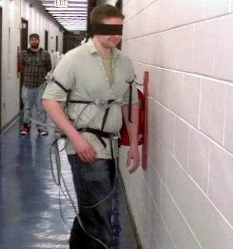 The test subjects had no trouble walking down hallways and detecting obstacles, but they did have some difficulty navigating through library bookshelves