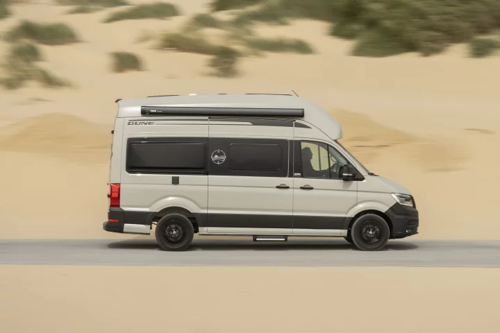The 2026 VW Grand California "Dune Edition" zips across the sandy desert that inspired it. Volkswagen's largest camper van gains some new capabilities in exploring off-the-beaten-path deserts, beaches and forests