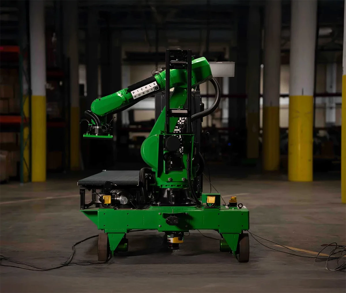 The robot moves and rotates autonomously, unloading shipping containers housing up to 1,200 boxes, each of which can weigh 50 lb