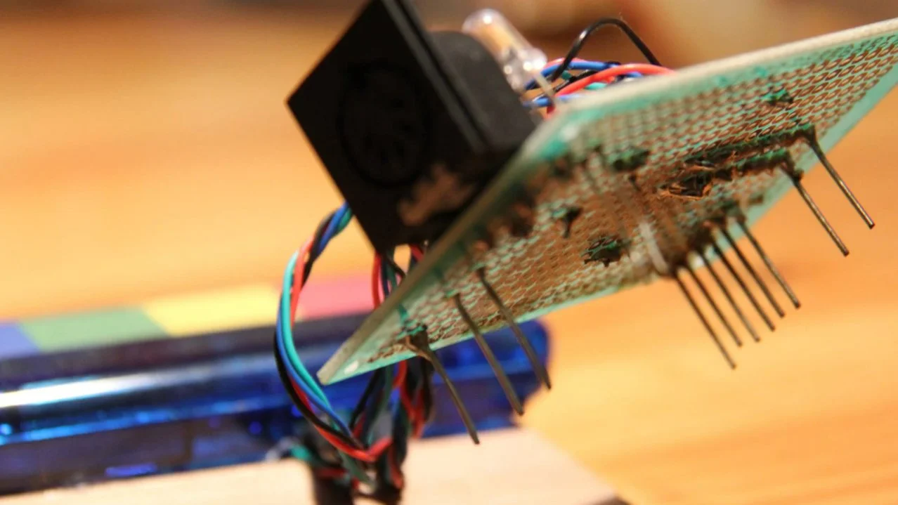 The circuitry jumps from the breadboard to circuit board