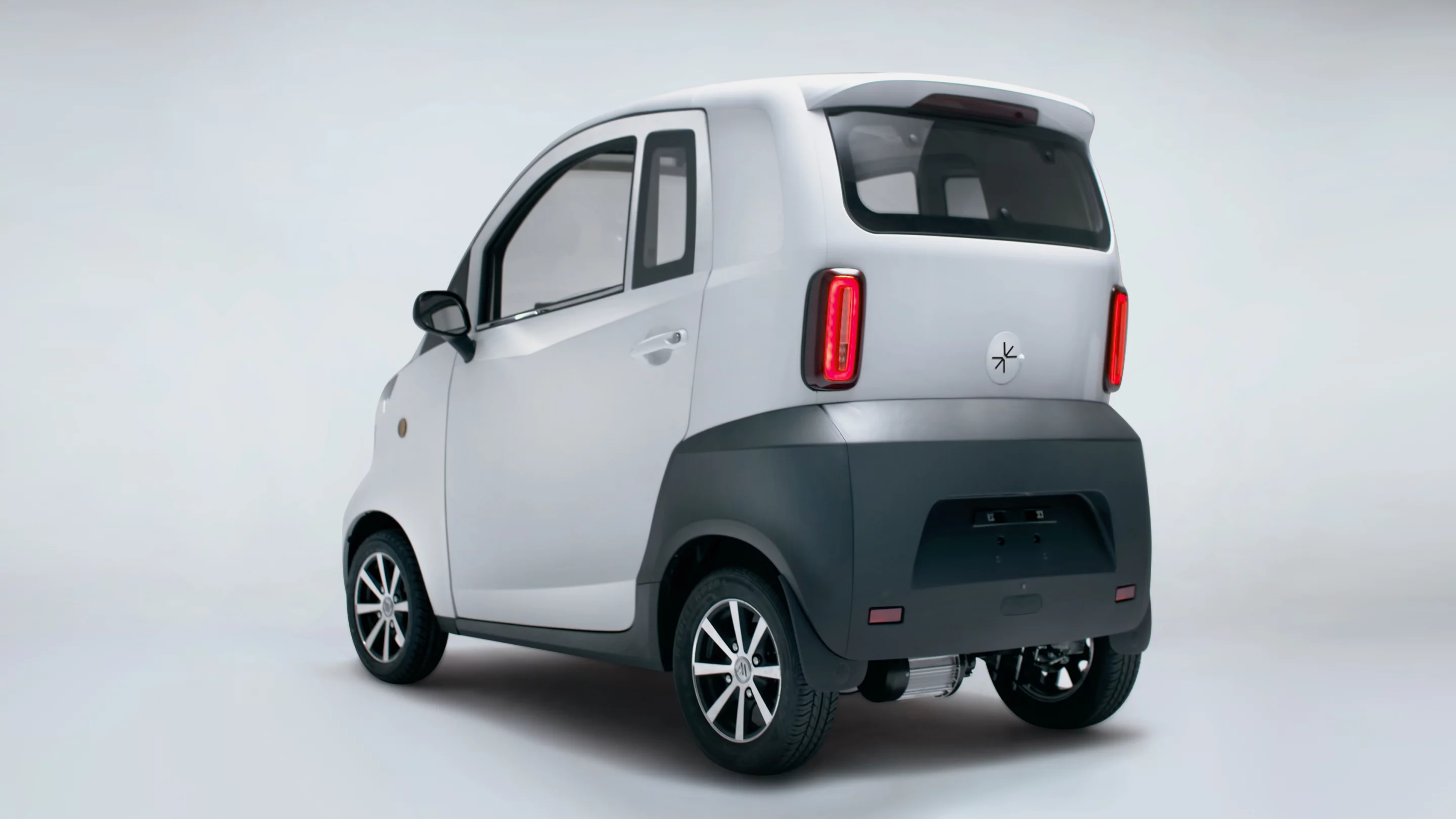 The Ark Zero rolls as a compact electric quadricycle for two, with a 28 mph top speed and a per-charge range of 50.3 miles