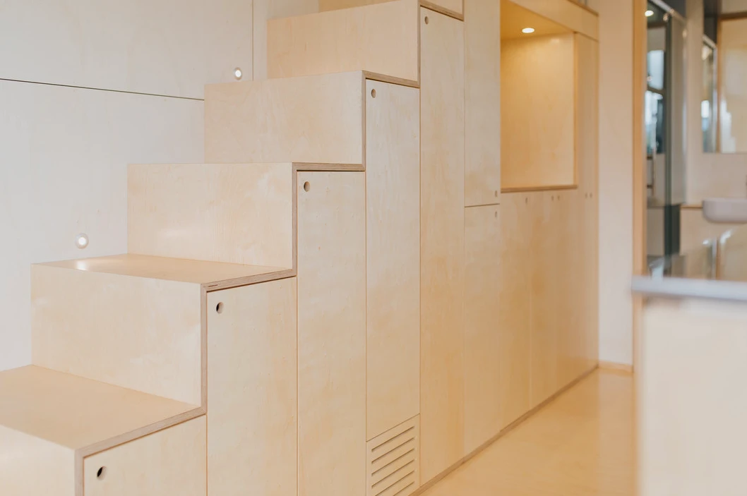 View of the First Light Tiny House's storage integrated staircase