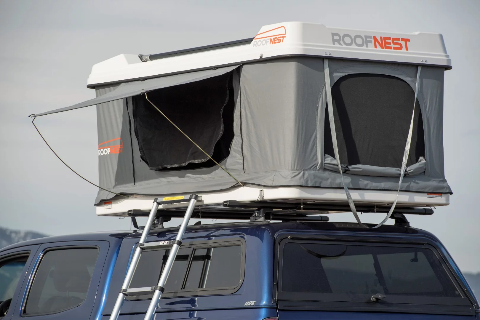 Roofnest keeps things simple with an awning/door flap design on the sides