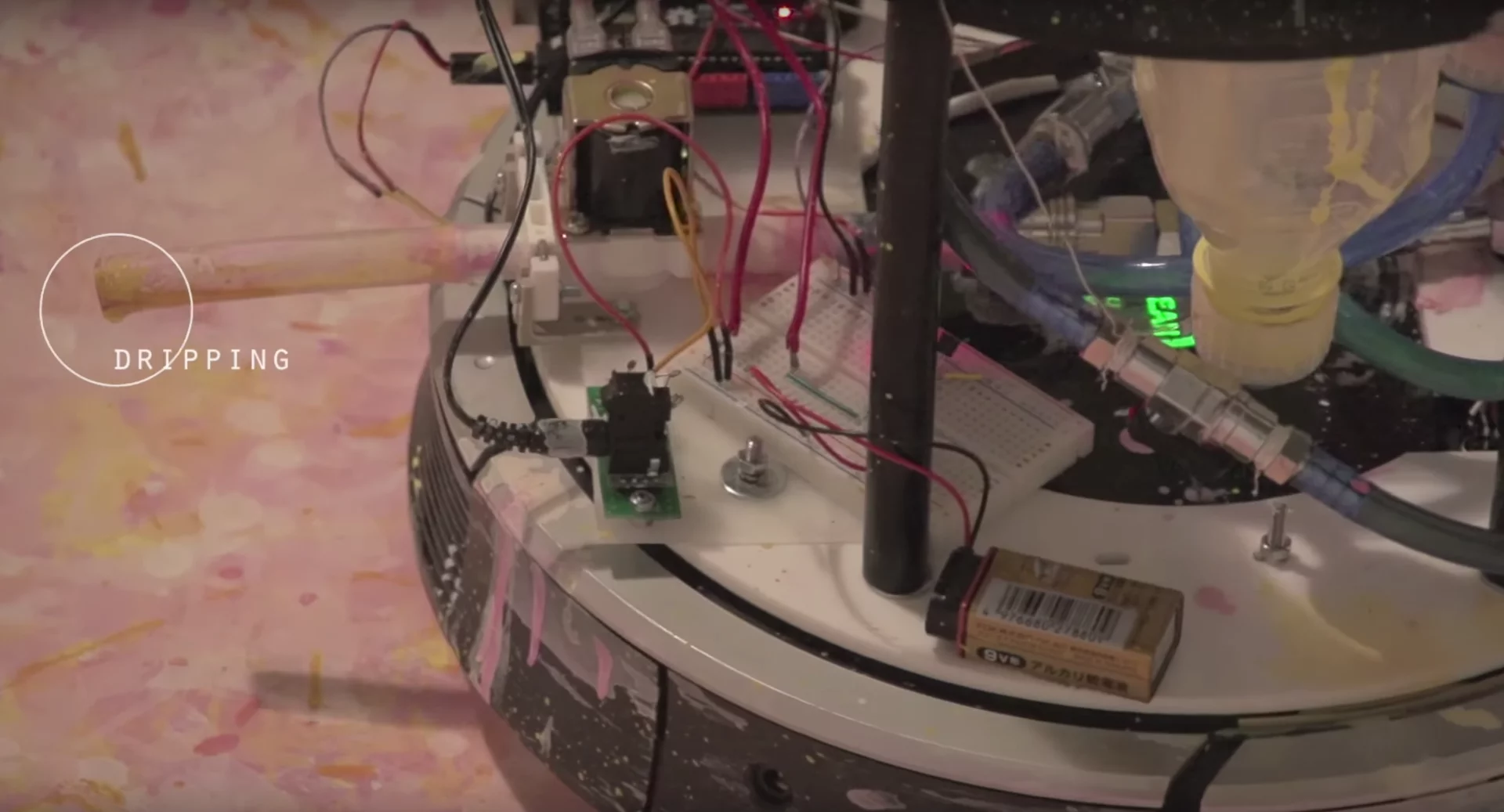 Mr. Head uses a drip technique similar to that of Jackson Pollock