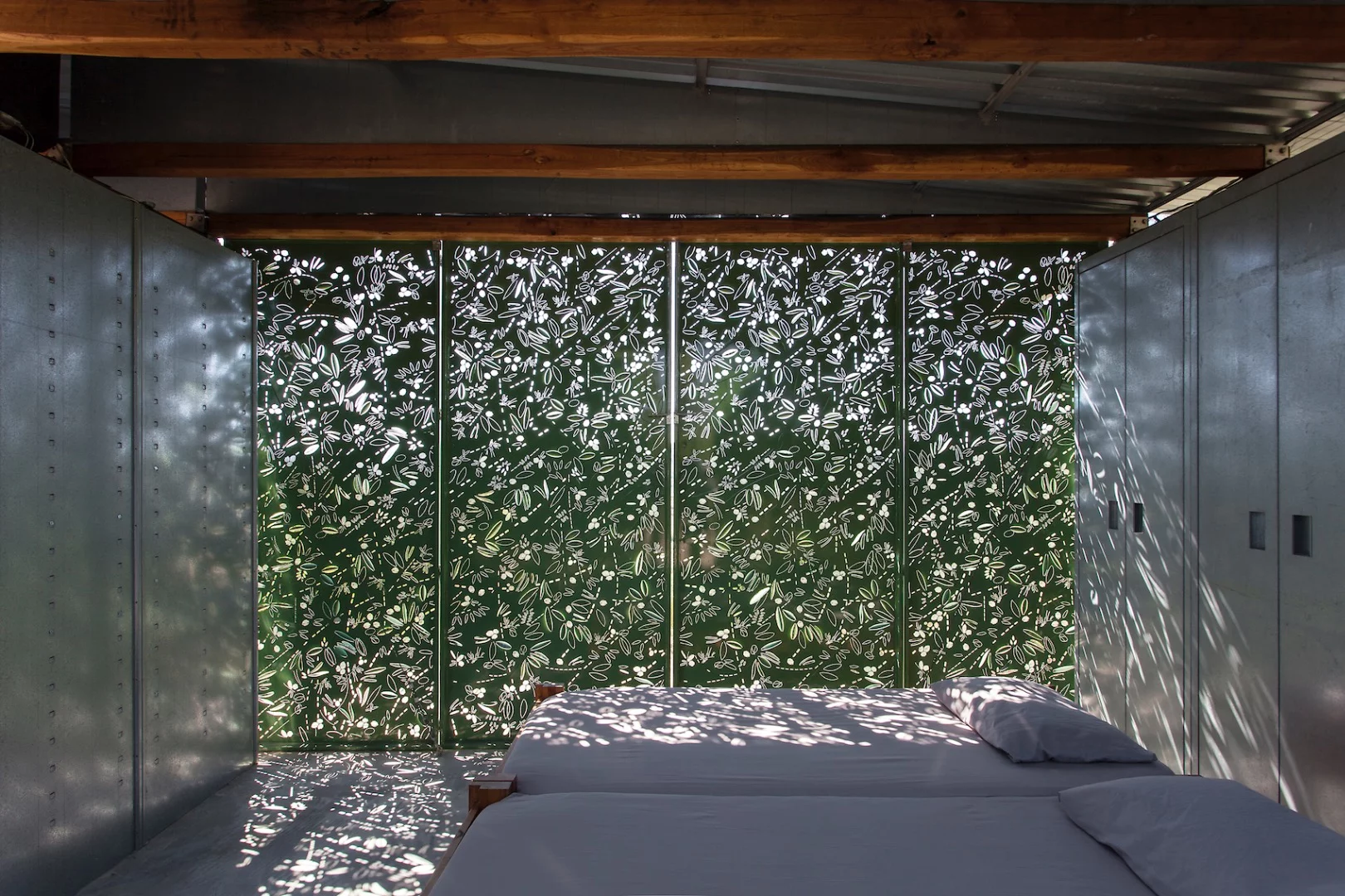 Even when the wall panels are closed, the Olive Tree House provides some ventilation