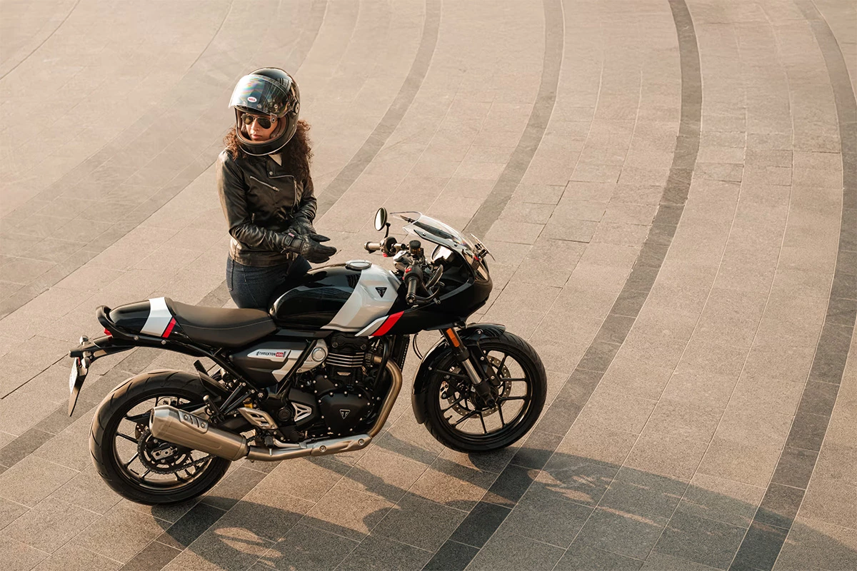The Thruxton 400's half fairing up front, pillion cowl, clip-on handlebars, and new tail lamp differentiate it from its small capacity siblings