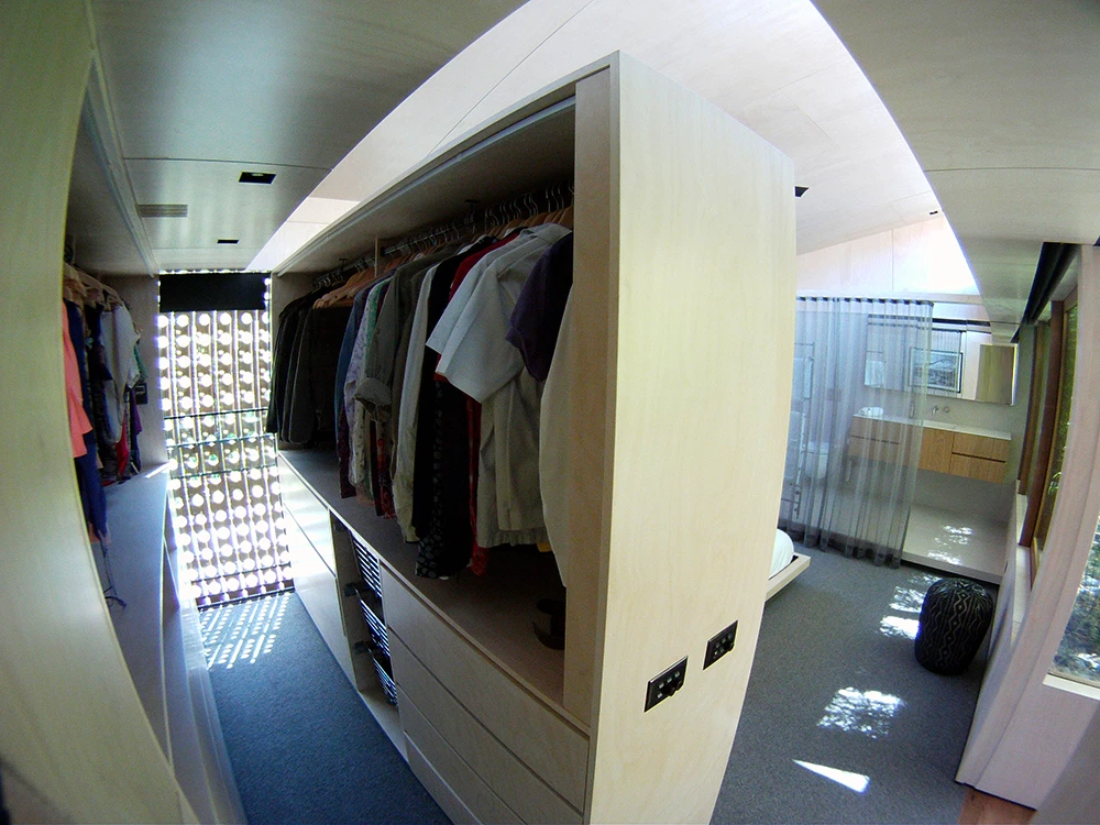 The home's interior design features hidden cupboards and pull down beds (Photo: Edoardo Campanale for Gizmag)