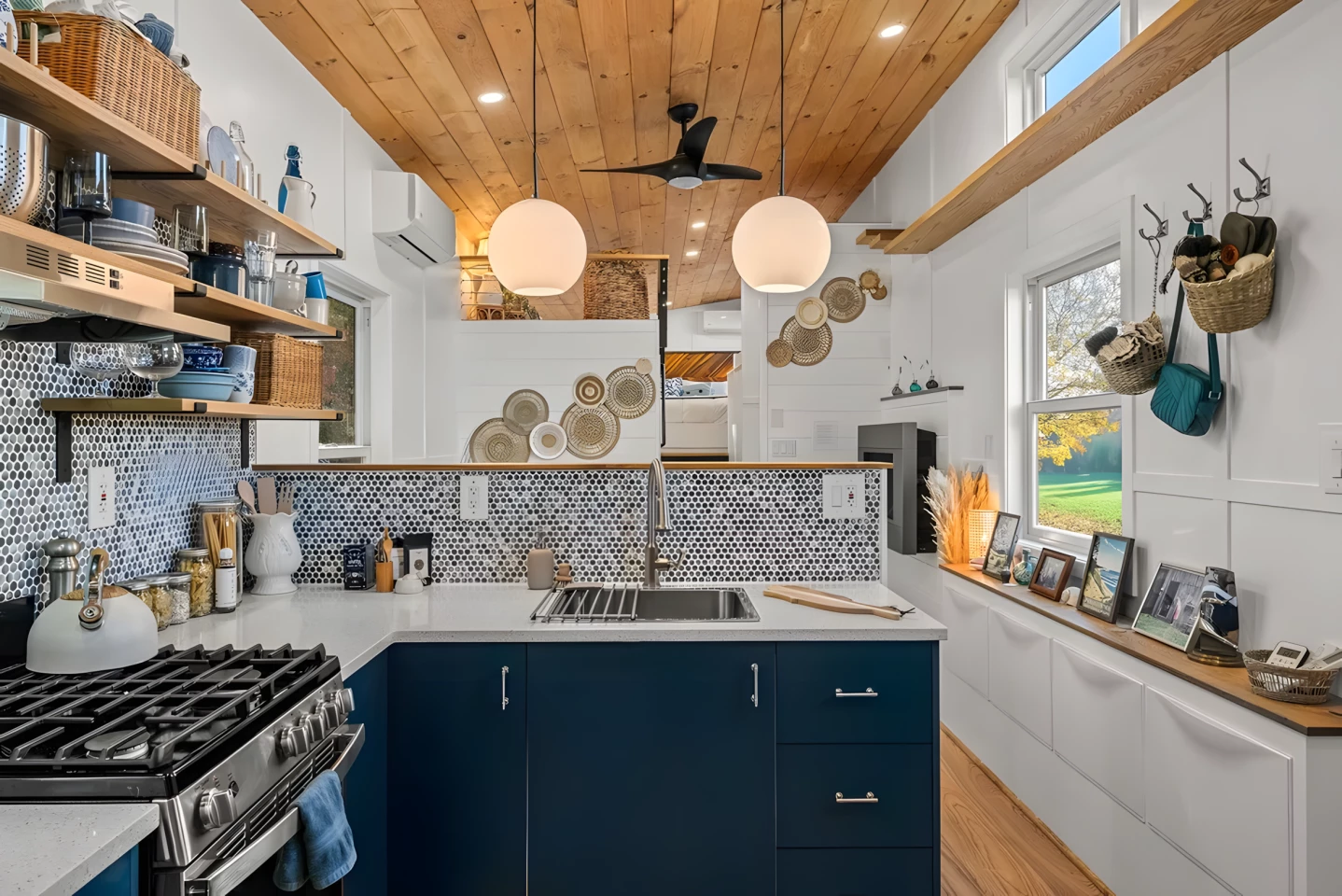 The Beachcomber’s kitchen includes an oven and a four-burner propane-powered cooktop