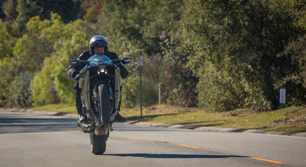 Turn the traction control off on the Kawasaki H2 and wheelies become an inevitability. They're not nice wheelies, though - they're uncontrollable tooth-bashers due to the heavy front end, vicious power and snatchy throttle