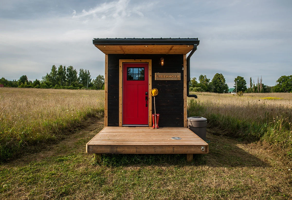 The front door of the Greenmoxie Tiny House sports a combination lock