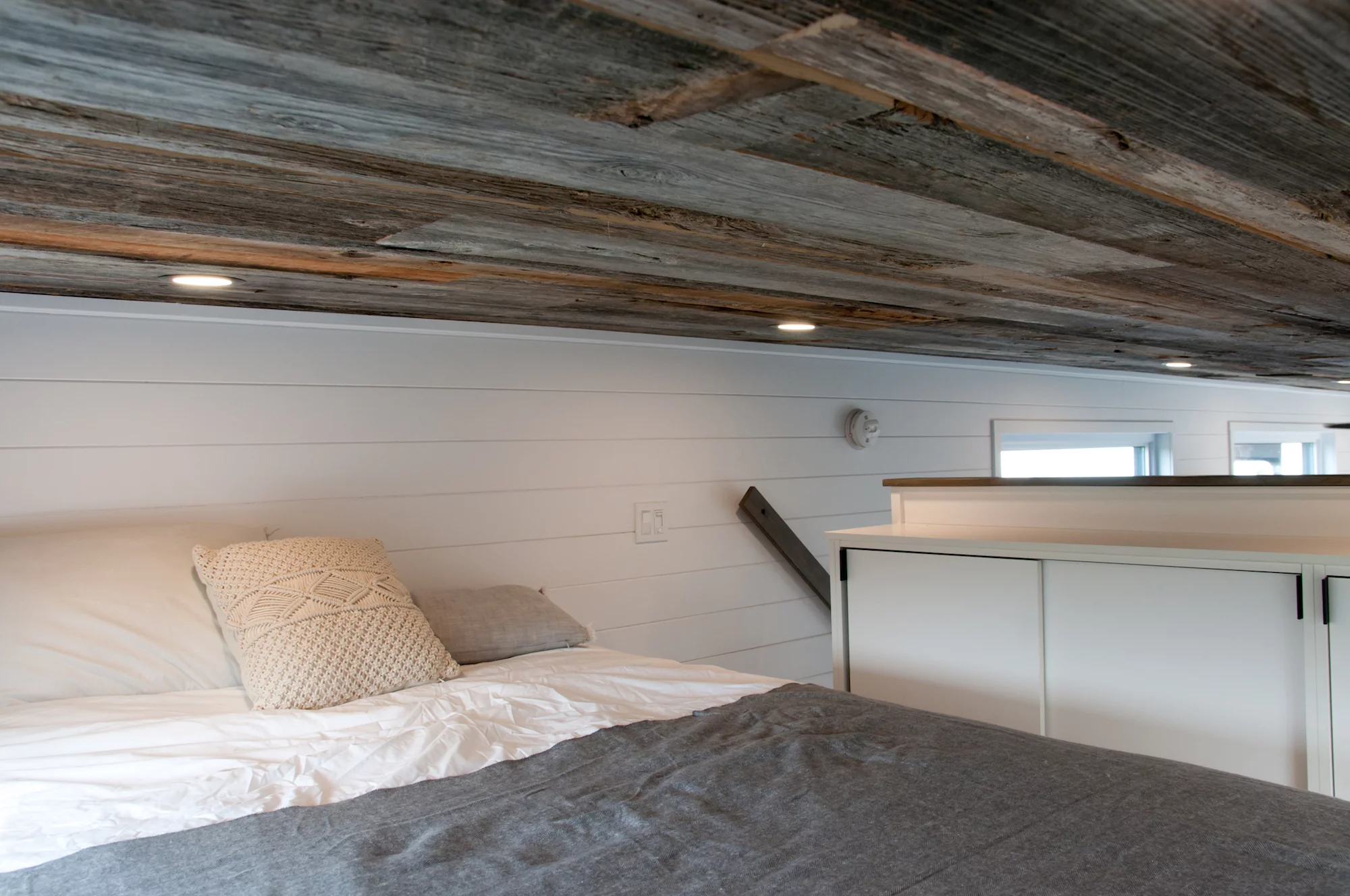 Baobab's loft bedroom has a low ceiling and includes a queen-sized bed