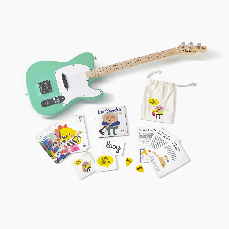 The Fender x Loog guitars come with chord flashcards, a couple of picks and a booklet describing the history of Fender's early models