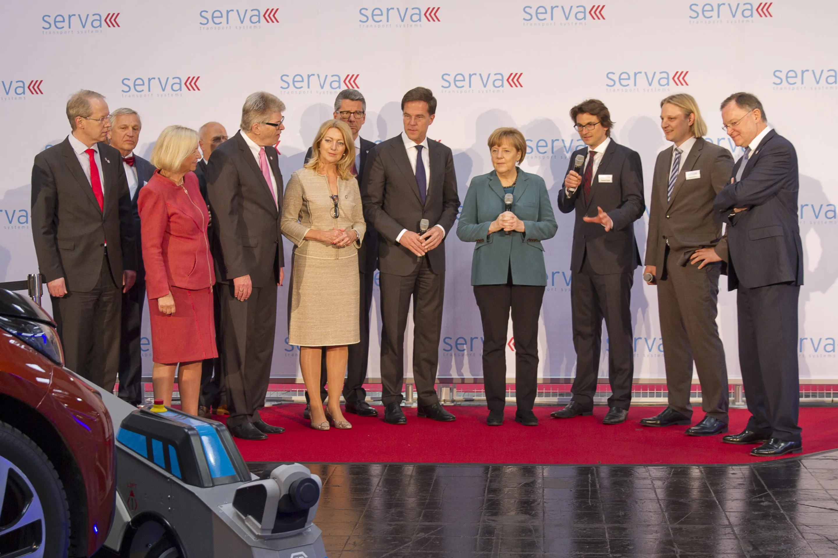 The Serva team introducing Ray, the autonomous parking robot
