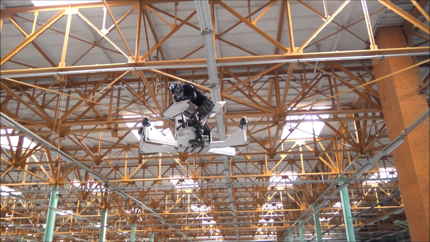 Hoversurf Scorpion: hoverbike pilot narrowly avoids banging his head on the roof beams of the factory