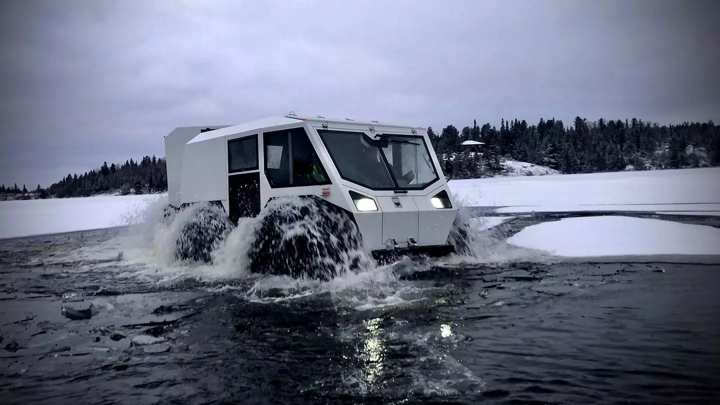 After diving in water, the Sherp Ark's large tires become paddles