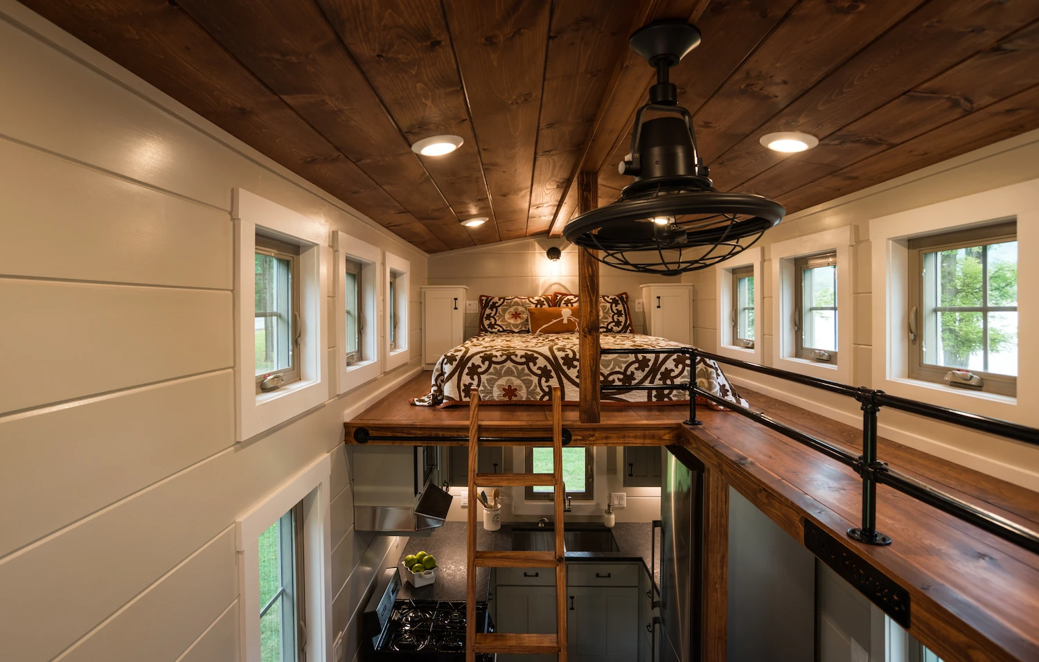 This loft bedroom is reached by ladder