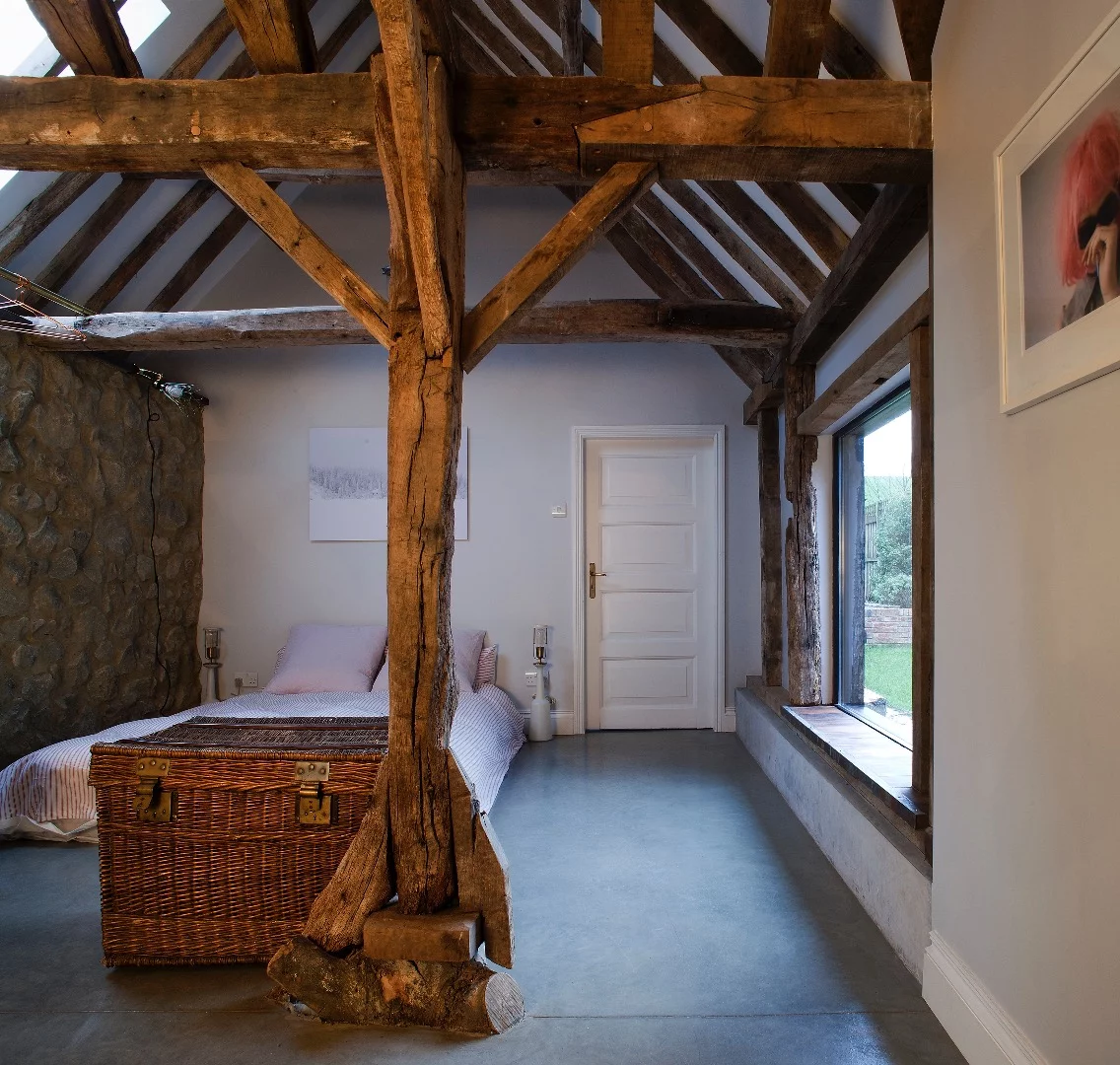 Existing green oak framing was painstakingly disassembled, removed and repaired, before being put back into place again
