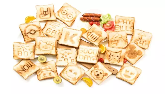 The Toasteroid works in conjunction with a smartphone app to burn reminders, emojis or even the weather into your toast