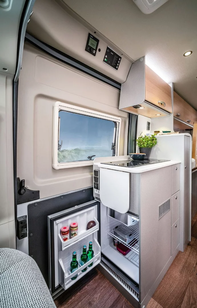 The smaller 65-L fridge on the 602 and 540 floor plans is mounted for indoor/outdoor access