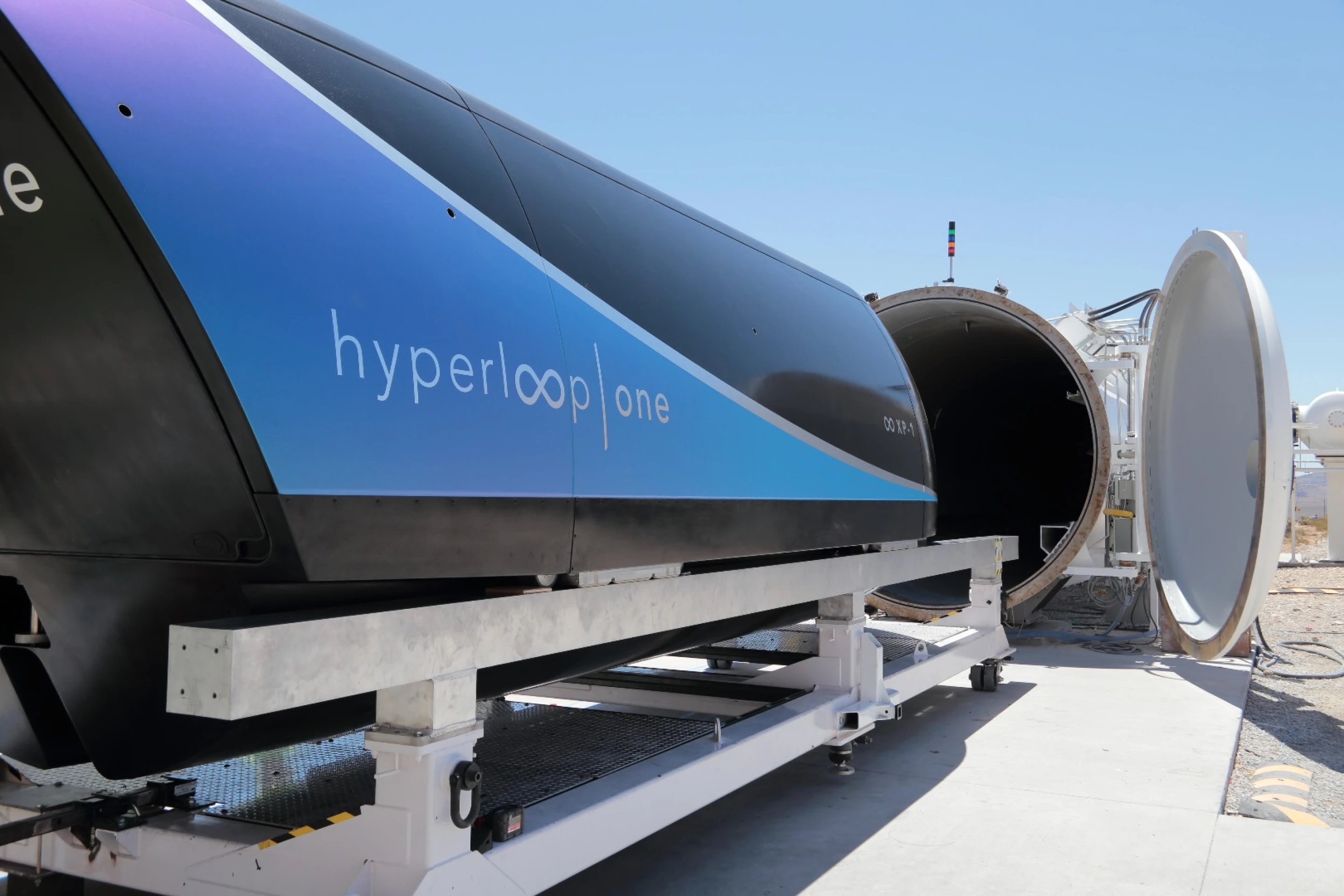 Hyperloop One passenger pod rides above the rails in first tube test