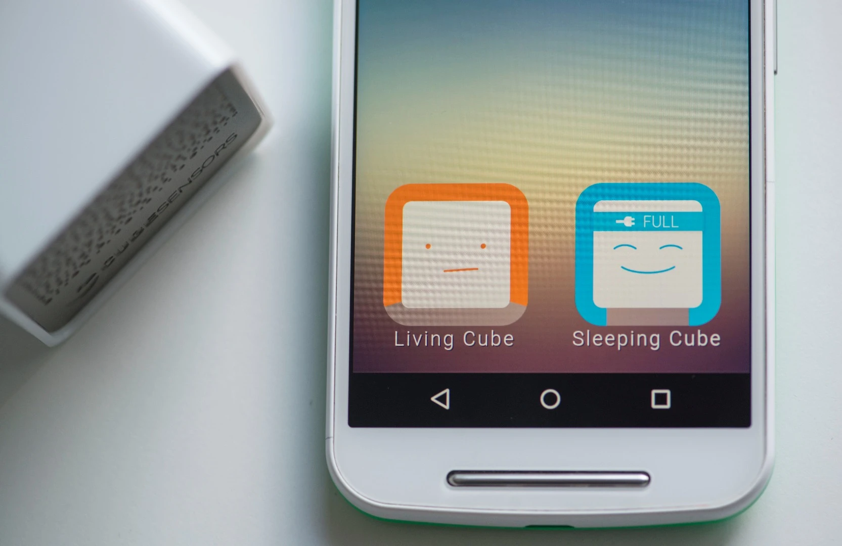 The CubeSensors app can give simple feedback on a scale of sad face to happy face