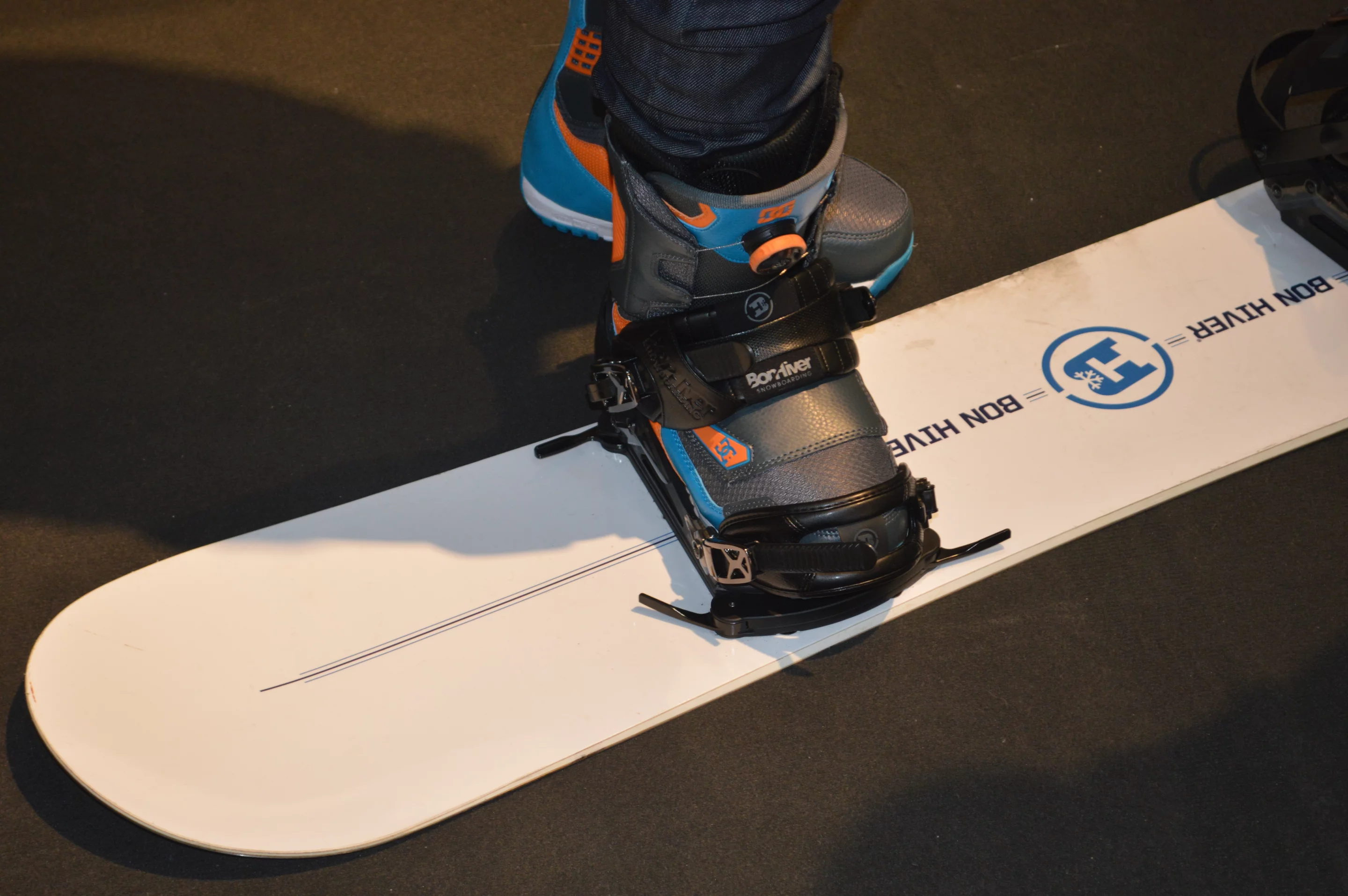 Bon Hiver's Freebase snowboard binding system combines the support of a strap binding with the ease of a step-in