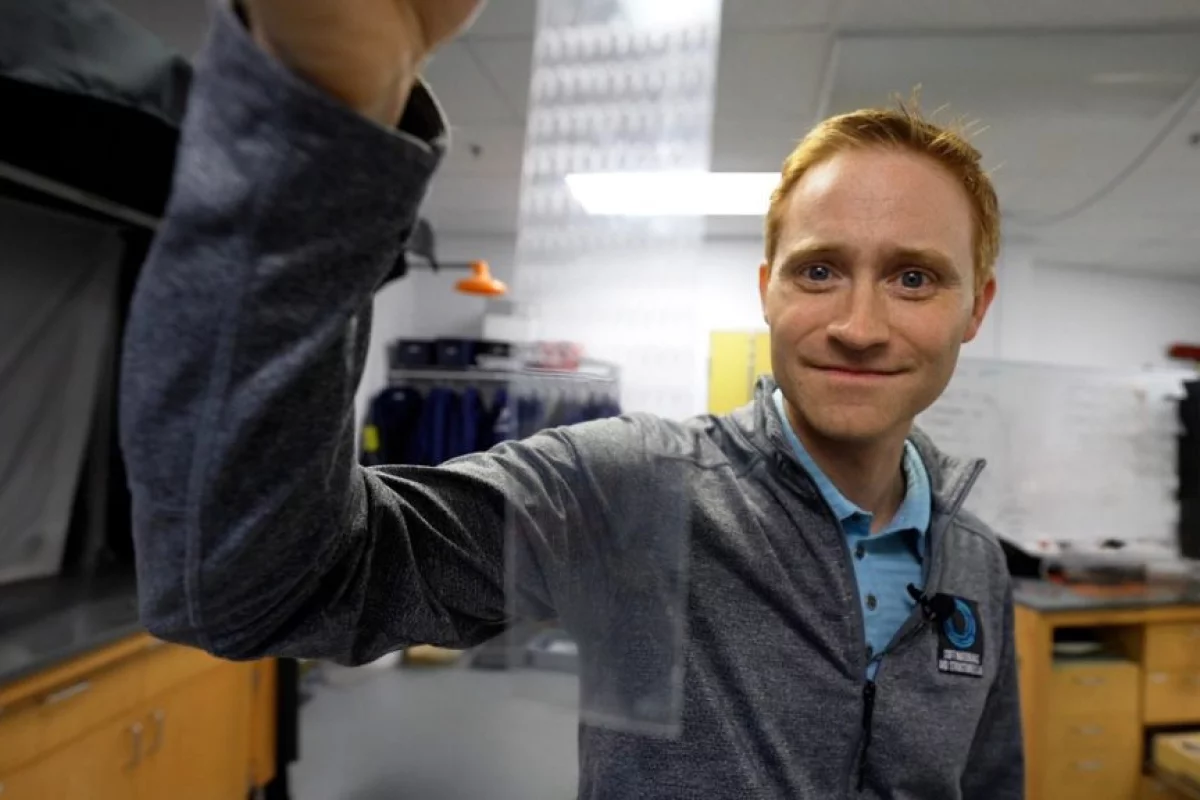 Assoc. Prof. Michael Bartlett with a piece of his craftily cut tape